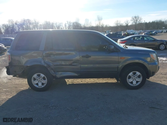2007 Honda Pilot LX with VIN 2HKYF18197H504905, listed as a IAAI auction lot 41293667 with 200,448 mi miles. Bid and sale history available at carsss.com. Image 13.
