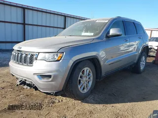 2018 Jeep Grand Cherokee Laredo E with VIN 1C4RJEAG9JC126080, listed as a IAAI auction lot 41355941 with 108,919 mi miles and . Bid and sale history available at DreamBid. Image 2.