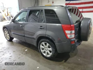 2012 Suzuki Grand Vitara Limited z VIN JS3TD0D76C4100949, wystawiony jako Copart lot #55834305 z przebiegiem 241 042 mil mil oraz Tytuł czysty. Historia ofert i sprzedaży dostępna na DreamBid. Obrazek 2.