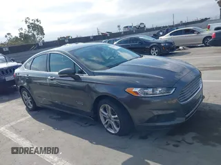 2016 Ford Fusion Titanium with VIN 3FA6P0SU9GR145186, listed as a IAAI auction lot 42023484 with 84,399 mi miles and . Bid and sale history available at DreamBid. Image 13.