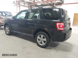 2011 Ford Escape Limited with VIN 1FMCU0EG0BKB30015, listed as a IAAI auction lot 41987953 with 203,057 mi miles. Bid and sale history available at carsss.com. Image 3.