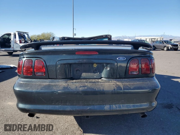 1998 Ford Mustang GT with VIN 1FAFP45X4WF216691, listed as a Copart auction lot 79389084 with 101,980 mi miles and Salvage Title. Bid and sale history available at carsss.com. Image 6.