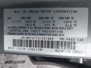 2016 Mazda 3 i Sport with VIN JM1BM1U71G1301889, listed as a IAAI auction lot 41531112 with 142,881 mi miles and . Bid and sale history available at DreamBid. Image 9.