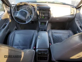 1999 Mercury Mountaineer z VIN 4M2ZU55P7XUJ42065, wystawiony jako Copart lot #85194624 z przebiegiem 304 261 mil mil oraz Szkoda całkowita • Salvage title. Historia ofert i sprzedaży dostępna na DreamBid. Obrazek 8.