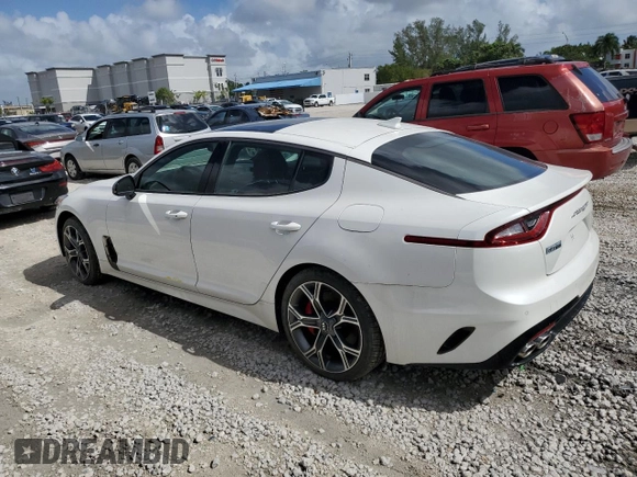 2021 Kia Stinger GT1 with VIN KNAE45LC9M6090262, listed as a Copart auction lot 77339854 with 3,354 mi miles and Salvage Title. Bid and sale history available at carsss.com. Image 2.