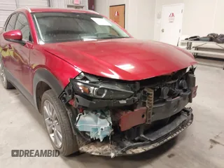 2021 Mazda CX-30 Premium with VIN 3MVDMADL8MM320149, listed as a IAAI auction lot 41317680 with 47,383 mi miles and . Bid and sale history available at DreamBid. Image 20.