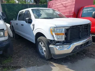 2021 Ford F-150 XL with VIN 1FTFW1E82MKD23506, listed as a IAAI auction lot 41876760 with 71,387 mi miles. Bid and sale history available at carsss.com. Image 1.