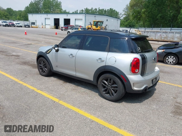 2012 MINI Countryman S with VIN WMWZC5C54CWM13119, listed as a IAAI auction lot 42467904 with 115,531 mi miles and . Bid and sale history available at DreamBid. Image 3.