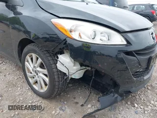 2015 Mazda 5 Sport with VIN JM1CW2BL2F0190990, listed as a IAAI auction lot 42532210 with 98,528 mi miles and . Bid and sale history available at DreamBid. Image 6.