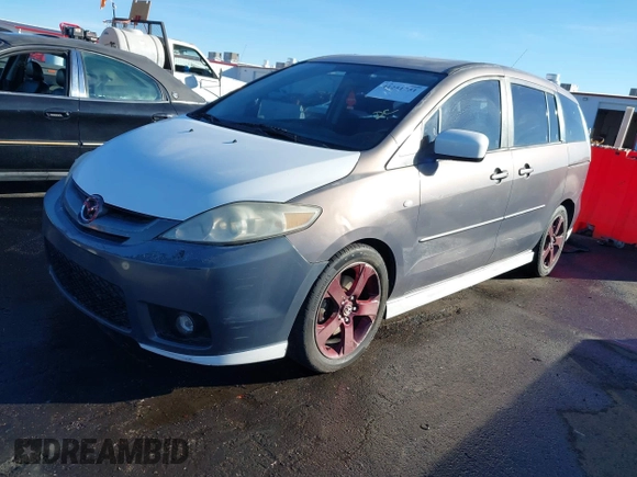 2007 Mazda 5 Touring with VIN JM1CR293770137040, listed as a IAAI auction lot 41251751 with 233,035 mi miles and . Bid and sale history available at DreamBid. Image 2.