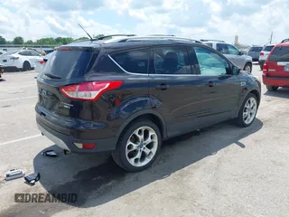 2013 Ford Escape Titanium with VIN 1FMCU9J90DUA01551, listed as a IAAI auction lot 42686247 with 190,707 mi miles and . Bid and sale history available at DreamBid. Image 4.