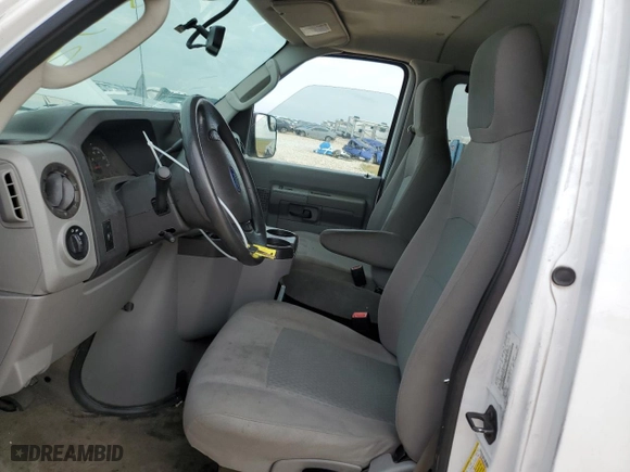 2014 Ford Econoline Wagon XL with VIN 1FBNE3BL4EDA25746, listed as a Copart auction lot 69606994 with 107,842 mi miles and Salvage Title. Bid and sale history available at carsss.com. Image 7.