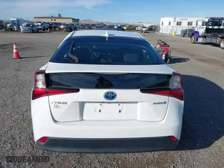 2021 Toyota Prius L Eco with VIN JTDKAMFU9M3150667, listed as a IAAI auction lot 41609328 with 59,177 mi miles. Bid and sale history available at carsss.com. Image 17.