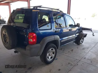 2002 Jeep Liberty Sport with VIN 1J4GL48K32W145174, listed as a IAAI auction lot 42028324 with 291,896 mi miles. Bid and sale history available at carsss.com. Image 4.