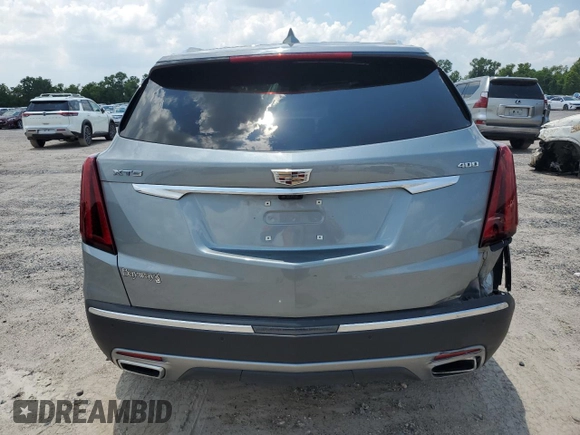 2023 Cadillac XT5 FWD Premium Luxury with VIN 1GYKNCRS3PZ135585, listed as a Copart auction lot 58891914 with 32,325 mi miles and Salvage Title. Bid and sale history available at carsss.com. Image 6.