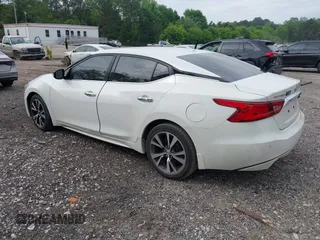 2016 Nissan Maxima SV z VIN 1N4AA6APXGC419665, wystawiony jako IAAI lot #42085939 z przebiegiem 158 000 mil mil oraz . Historia ofert i sprzedaży dostępna na DreamBid. Obrazek 3.