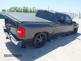 2010 Chevrolet Silverado 1500 LT with VIN 3GCRCSE06AG138545, listed as a IAAI auction lot 41990971 with 243,252 mi miles and . Bid and sale history available at DreamBid. Image 4.