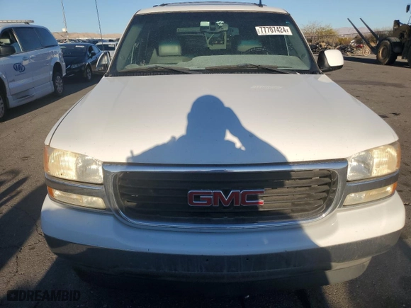 2006 GMC Yukon SLE with VIN 1GKEC13Z86R138116, listed as a Copart auction lot 77707424 with 195,129 mi miles and Salvage Title. Bid and sale history available at carsss.com. Image 5.