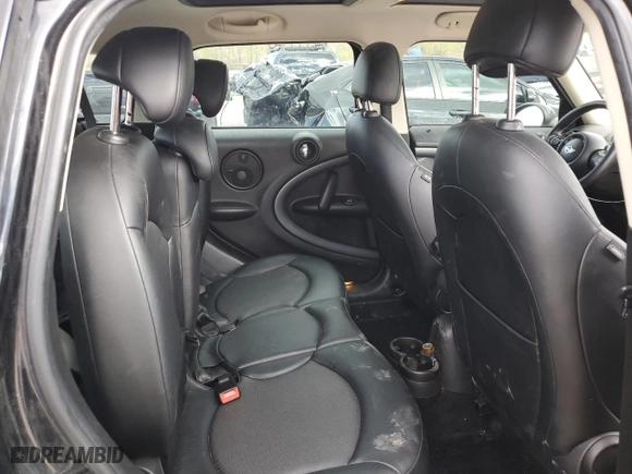 2016 MINI Cooper Countryman S with VIN WMWZC5C50GWU03080, listed as a Copart auction lot 52864144 with 70,949 mi miles and Salvage Title. Bid and sale history available at carsss.com. Image 10.