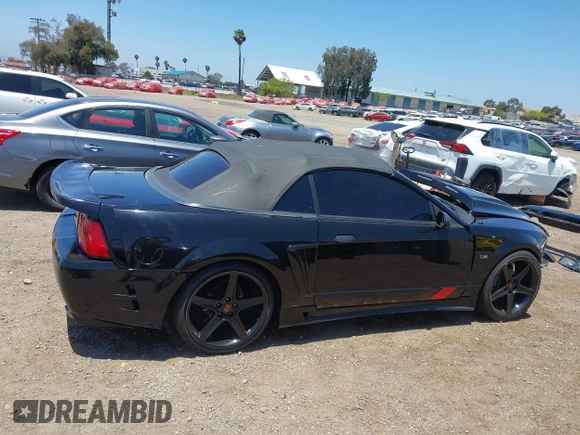 2002 Ford Mustang GT Deluxe with VIN 1FAFP45X92F229236, listed as a IAAI auction lot 42565552 with 122,504 mi miles and . Bid and sale history available at DreamBid. Image 14.
