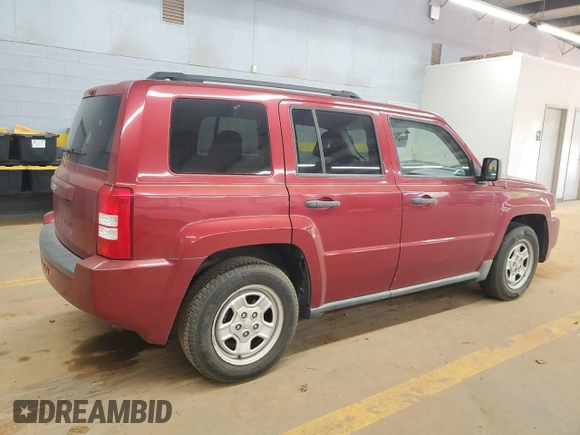 2007 Jeep Patriot Sport with VIN 1J8FT28W67D358205, listed as a Copart auction lot 52323215 with 133,212 mi miles and Salvage Title. Bid and sale history available at DreamBid. Image 3.