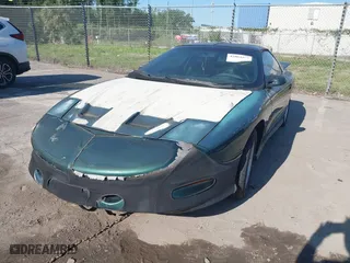 1996 Pontiac Firebird Formula with VIN 2G2FV22P5T2221912, listed as a IAAI auction lot 42004189 with 130,655 mi miles. Bid and sale history available at carsss.com. Image 2.