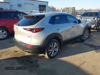 2024 Mazda CX-30 S Premium with VIN 3MVDMBDM9RM628162, listed as a IAAI auction lot 41262359 with 30,392 mi miles and . Bid and sale history available at DreamBid. Image 4.