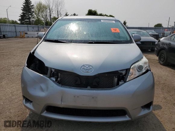 2014 Toyota Sienna L with VIN 5TDZK3DC8ES442973, listed as a Copart auction lot 59660055 with 310,496 mi miles and Salvage title. Bid and sale history available at DreamBid. Image 5.