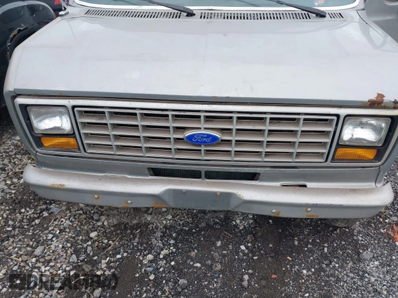 1990 Ford Econoline Cargo z VIN 1FTDE14Y4LHA18080, wystawiony jako IAAI lot #42324693 z przebiegiem Nie podano mil oraz . Historia ofert i sprzedaży dostępna na DreamBid. Obrazek 6.