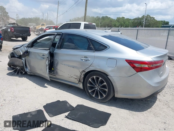 2018 Toyota Avalon XLE with VIN 4T1BK1EB7JU281738, listed as a IAAI auction lot 42148342 with 118,049 mi miles and . Bid and sale history available at DreamBid. Image 3.