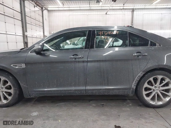 2015 Ford Taurus Limited with VIN 1FAHP2J8XFG192225, listed as a IAAI auction lot 41324244 with 100,395 mi miles. Bid and sale history available at carsss.com. Image 14.