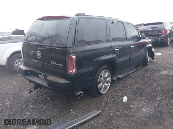 2002 Cadillac Escalade z VIN 1GYEK63N62R205809, wystawiony jako IAAI lot #41090723 z przebiegiem 180 631 mil mil oraz . Historia ofert i sprzedaży dostępna na DreamBid. Obrazek 4.