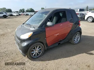 2014 Smart fortwo Pure z VIN WMEEJ3BA1EK753320, wystawiony jako Copart lot #55665555 z przebiegiem 71 305 mil mil oraz Szkody całkowita. Historia ofert i sprzedaży dostępna na DreamBid. Obrazek 1.