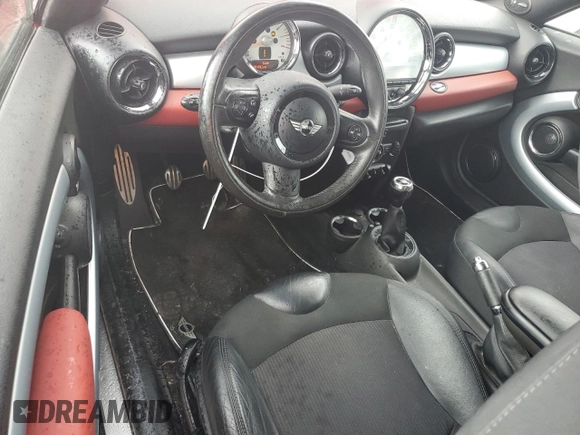 2012 MINI Coupe S z VIN WMWSX3C54CT155356, wystawiony jako Copart lot #72522854 z przebiegiem 91 982 mil mil oraz Szkody całkowita. Historia ofert i sprzedaży dostępna na DreamBid. Obrazek 8.