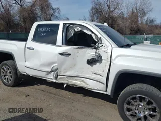 2017 GMC Sierra 1500 Denali with VIN 3GTU2PEC2HG438632, listed as a IAAI auction lot 41838632 with 80,319 mi miles and . Bid and sale history available at DreamBid. Image 6.
