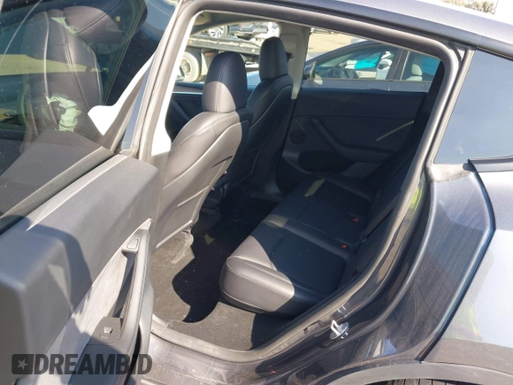 2023 Tesla Model Y Performance with VIN 7SAYGDEF5PF823122, listed as a IAAI auction lot 41546480 with 12,943 mi miles and . Bid and sale history available at DreamBid. Image 8.