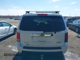 2011 Honda Pilot Touring with VIN 5FNYF4H96BB014095, listed as a IAAI auction lot 41794052 with 202,440 mi miles and . Bid and sale history available at DreamBid. Image 16.