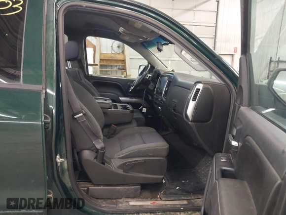 2015 Chevrolet Silverado 1500 LT with VIN 1GCVKREC2FZ147321, listed as a IAAI auction lot 41995003 with 148,053 mi miles and . Bid and sale history available at DreamBid. Image 5.