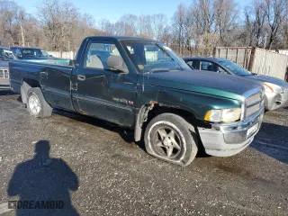 1999 Dodge Ram 1500 with VIN 1B7HC16Z9XS154873, listed as a Copart auction lot 82997084 with 165,875 mi miles and Salvage Title. Bid and sale history available at carsss.com. Image 4.