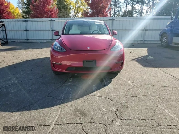 2023 Tesla Model Y Long Range with VIN 7SAYGAEE4PF661456, listed as a Copart auction lot 75551534 with 28,524 mi miles and Salvage Title. Bid and sale history available at carsss.com. Image 11.