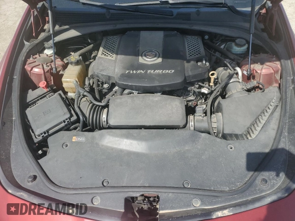 2014 Cadillac CTS Vsport RWD z VIN 1G6AU5S85E0160488, wystawiony jako Copart lot #53439575 z przebiegiem 146 309 mil mil oraz Szkoda całkowita • Salvage title. Historia ofert i sprzedaży dostępna na DreamBid. Obrazek 11.