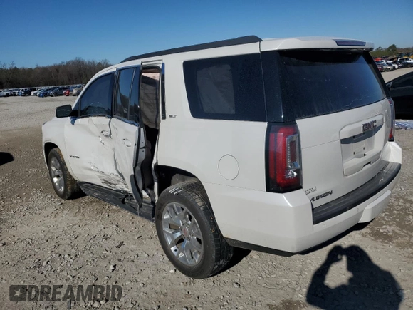 2017 GMC Yukon SLT with VIN 1GKS1BKC5HR337672, listed as a Copart auction lot 88647345 with 121,648 mi miles and Salvage Title. Bid and sale history available at carsss.com. Image 2.