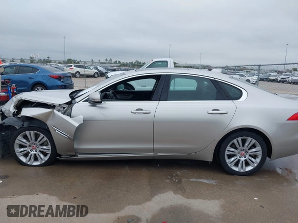 2017 Jaguar XF 35t Premium with VIN SAJBD4BV4HCY27802, listed as a IAAI auction lot 41076758 with 106,298 mi miles. Bid and sale history available at carsss.com. Image 14.