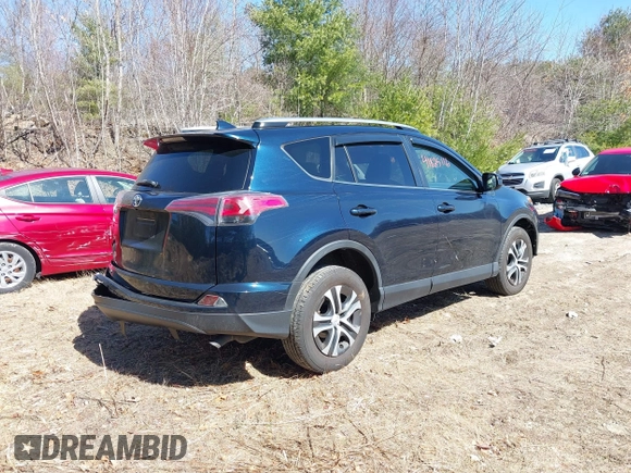 2017 Toyota RAV4 LE with VIN JTMBFREV9HJ704140, listed as a IAAI auction lot 41825116 with 75,007 mi miles and . Bid and sale history available at carsss.com. Image 4.