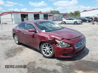 2012 Nissan Maxima S z VIN 1N4AA5AP0CC821571, wystawiony jako IAAI lot #42171453 z przebiegiem 121 859 mil mil oraz . Historia ofert i sprzedaży dostępna na DreamBid. Obrazek 1.