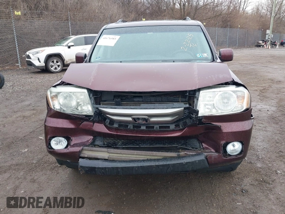 2011 Honda Pilot EX-L with VIN 5FNYF4H61BB091947, listed as a IAAI auction lot 41676585 with 227,751 mi miles and . Bid and sale history available at DreamBid. Image 13.