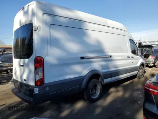 2016 Ford Transit Cargo with VIN 1FTBF4XG7GKA26157, listed as a Copart auction lot 84770754 with 137,282 mi miles and Salvage Title. Bid and sale history available at carsss.com. Image 3.