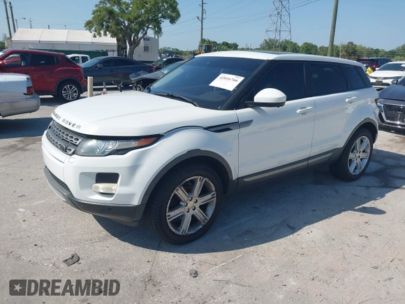 2015 Land Rover Range Rover Evoque Pure Premium z VIN SALVR2BG0FH964683, wystawiony jako IAAI lot #42016766 z przebiegiem 94 942 mil mil oraz . Historia ofert i sprzedaży dostępna na DreamBid. Obrazek 2.