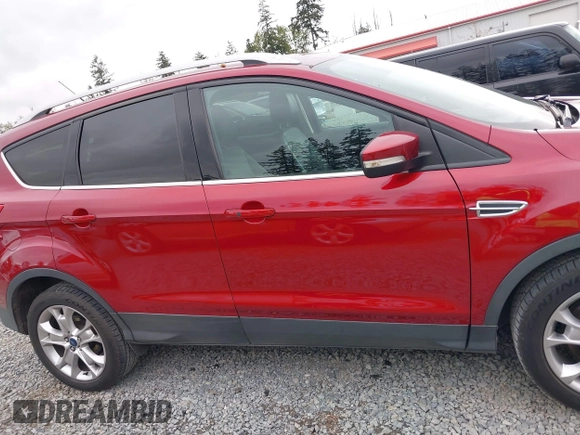 2014 Ford Escape Titanium with VIN 1FMCU9J9XEUD71715, listed as a IAAI auction lot 42127982 with 96,549 mi miles and . Bid and sale history available at DreamBid. Image 13.