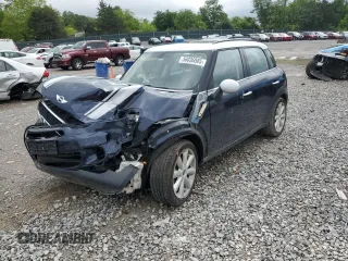 2014 MINI Countryman S z VIN WMWZC3C57EWP28911, wystawiony jako Copart lot #56036885 z przebiegiem 130 139 mil mil oraz Szkoda całkowita • Salvage title. Historia ofert i sprzedaży dostępna na DreamBid. Obrazek 1.